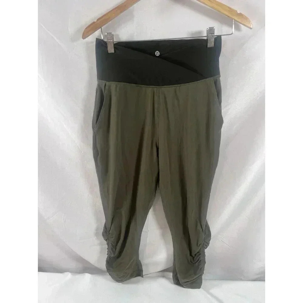 Lululemon Sunset Salutation Crop Leggings Sz 8 Fatigue Green/Ziggy Snake Pockets